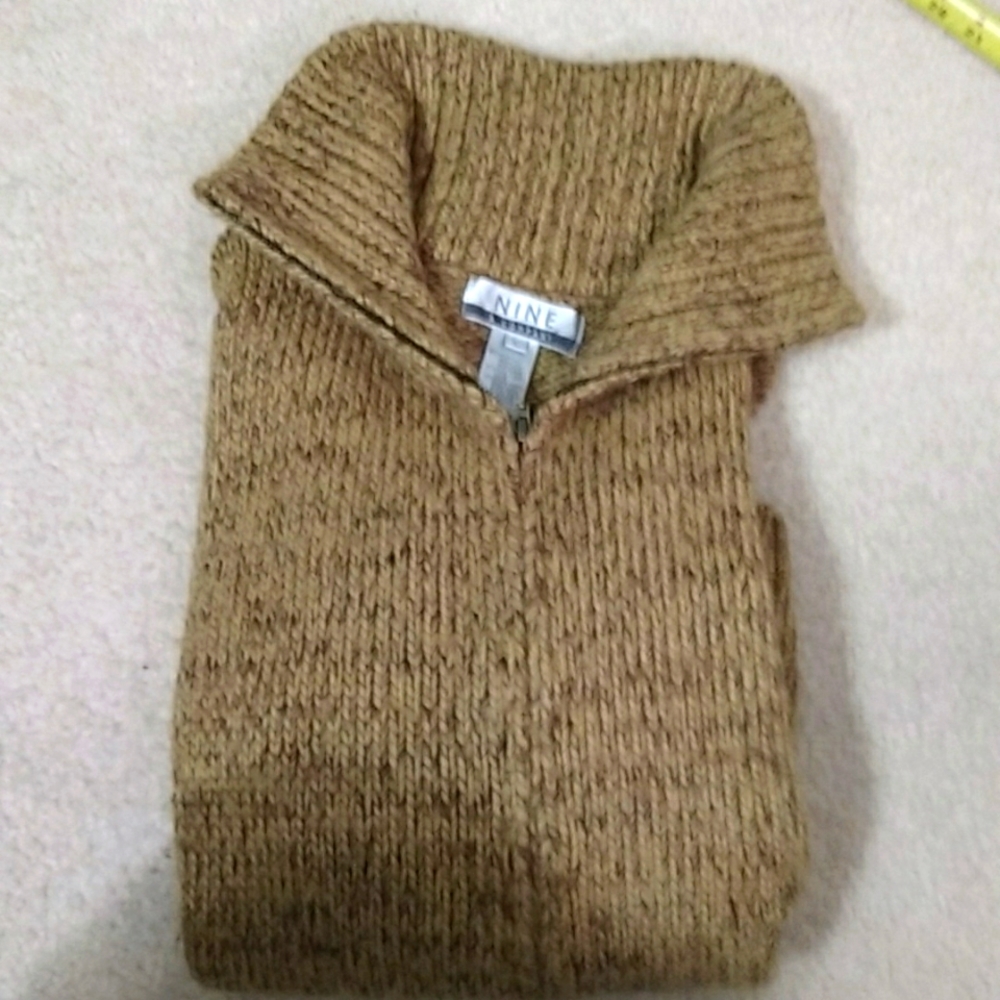 Brown turtleneck sweater